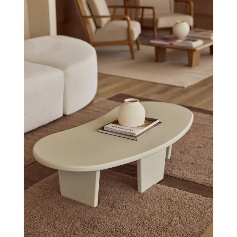 Mesa de centro de microcemento de formas orgánicas con tres patas tono blanco roto de 120cm - Mesas de centro